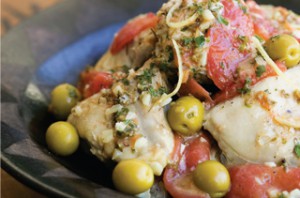 Country chicken with tomatoes and olives.